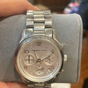 Silver tone white face Michael Kors watch slightly used